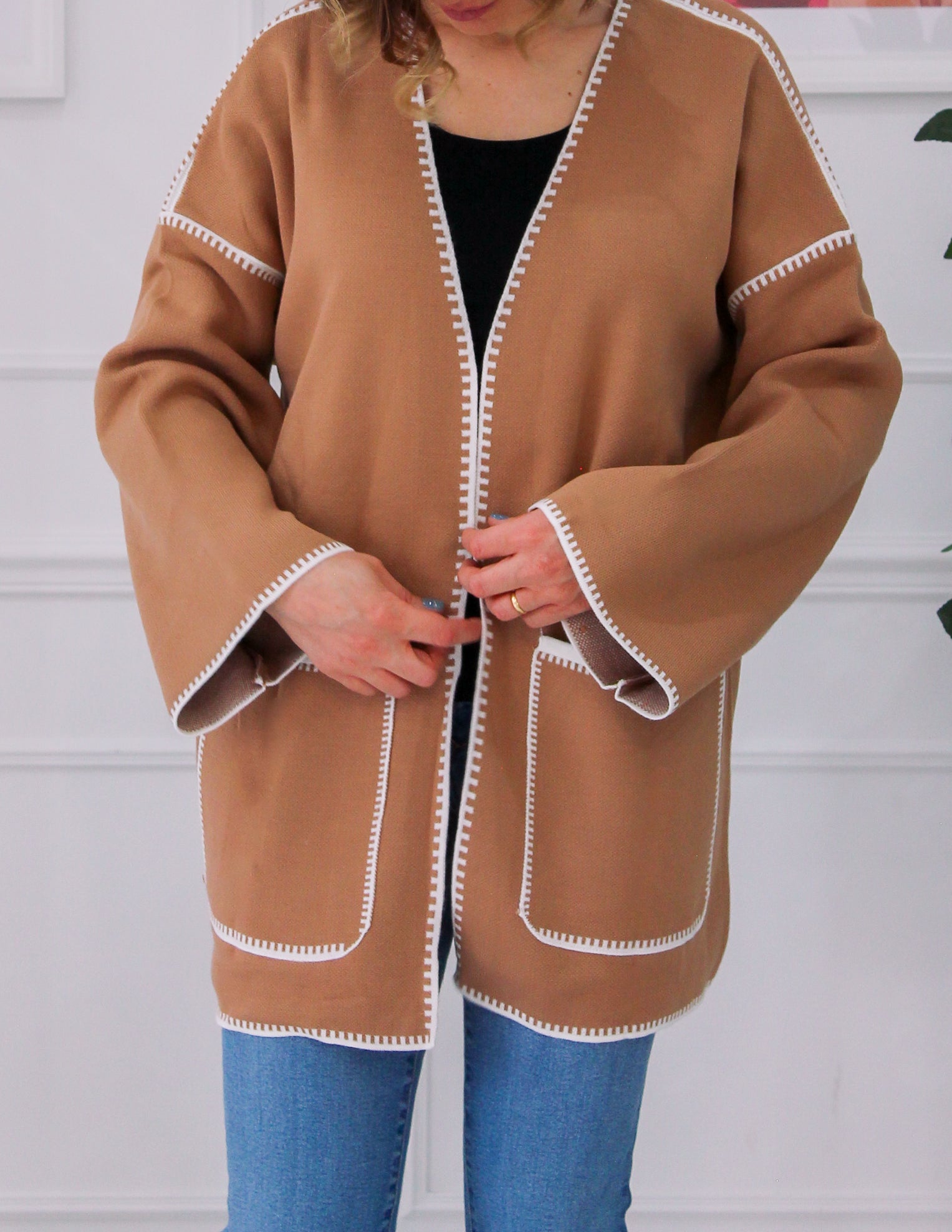 Topstitched patterned vest