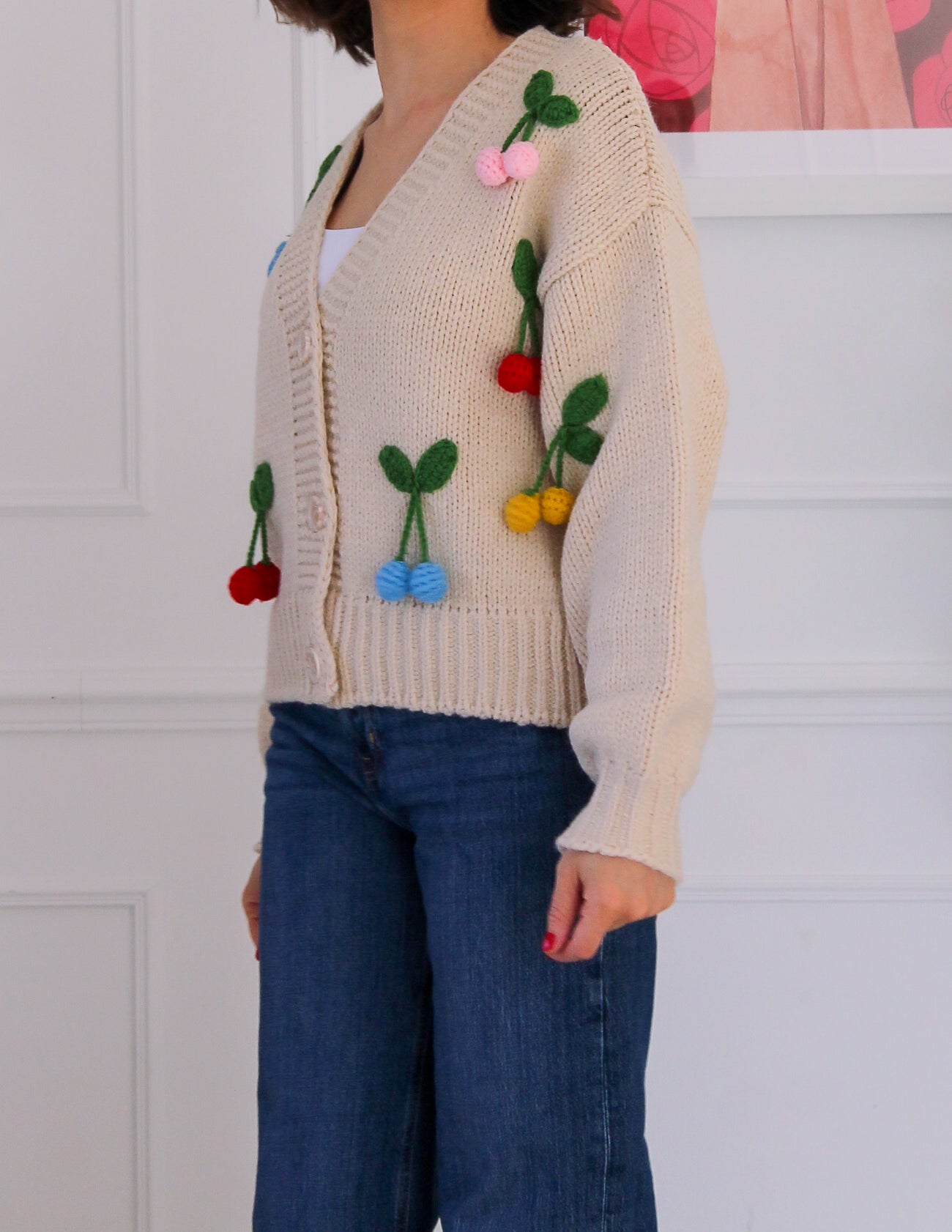 Gilet beige avec cerises en relief