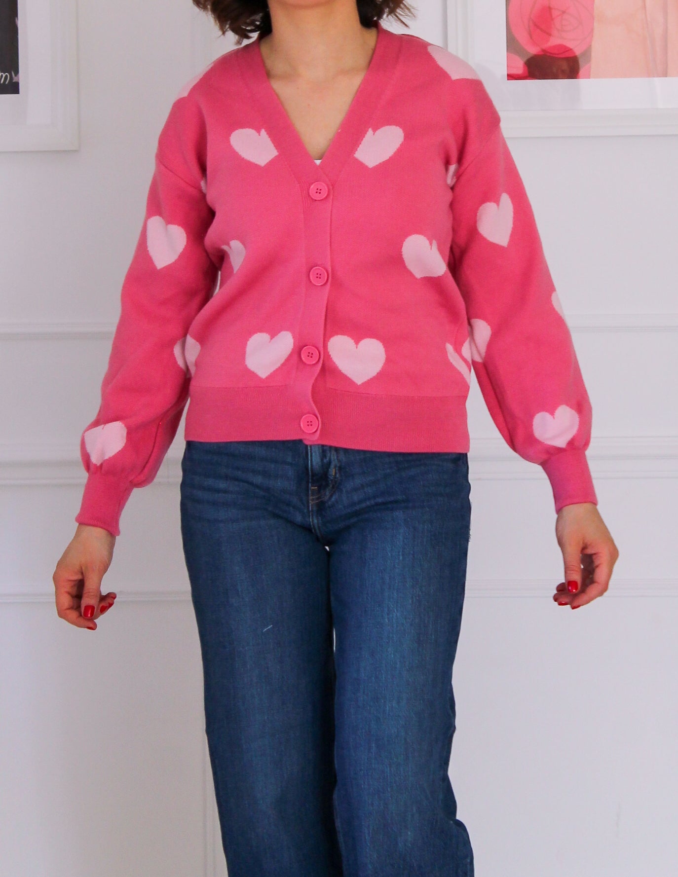 Short cardigan with powder pink heart patterns