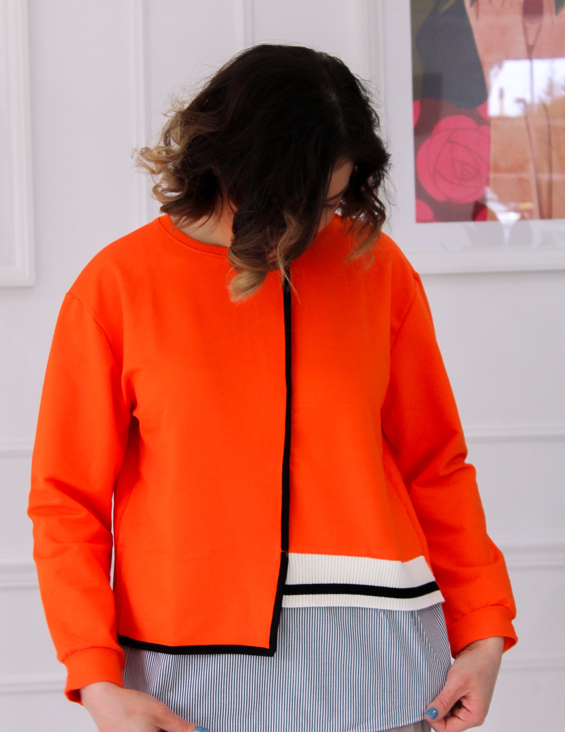 Pull orange bi-matière